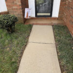 Huntersville home's front walkway and landing after a professional pressure washing service