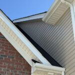 Clean siding on the 2nd floor of a Matthews, NC home after soft washing
