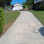 Same driveway bright and deeply cleaned after a deep surface cleaning.