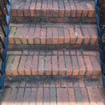 dirty moldy brick stairs in Matthews, NC