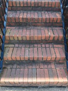 dirty moldy brick stairs in Matthews, NC